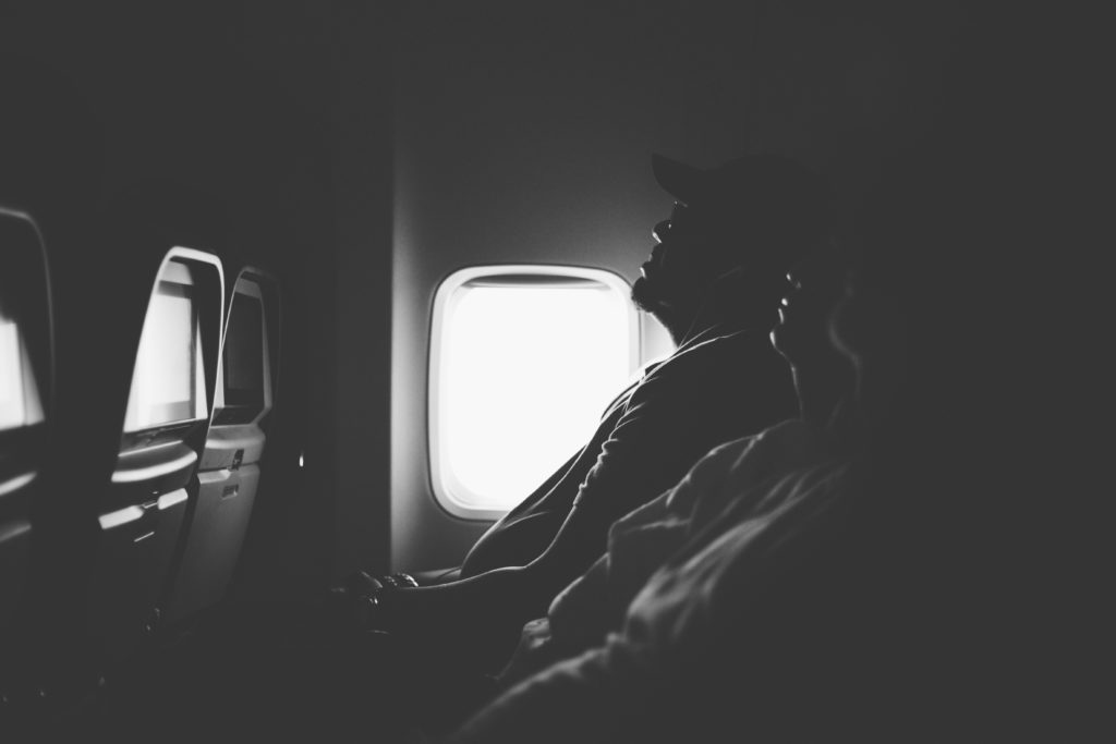 people sleeping on airplane